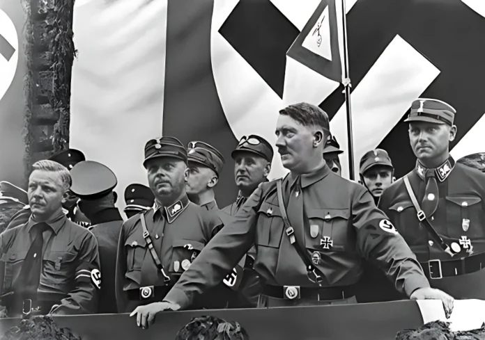 Adolf Hitler speaking at a political rally in Germany, circa 1933.